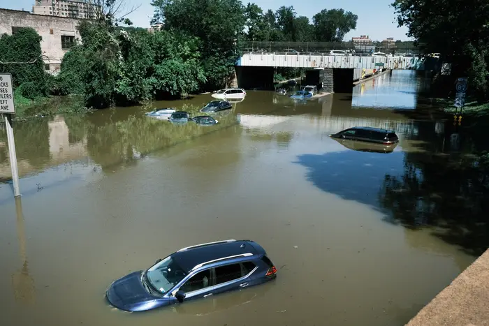 ars sit abandoned on the flooded Major Deegan Expressway following a night of extremely heavy rain from the remnants of Hurricane Ida on Sept. 2, 2021 in the Bronx.